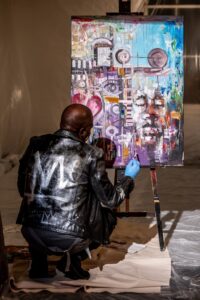 Photo by Dahlia Katz Moses Salihou painting in Improvisation as Life